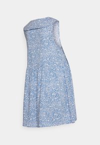 Vestido floral azul com design sem mangas, decote redondo e silhueta evasê, apresentando um padrão de flores brancas sobre um fundo azul.