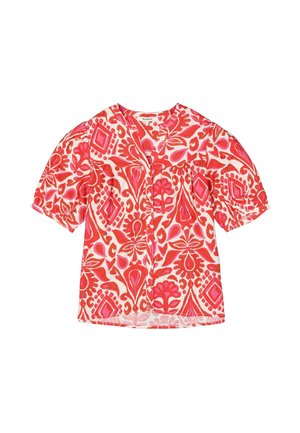 Kurzärmlige Bluse aus lebhaftem roten und pinken Baumwollstoff mit floralen und geometrischen Mustern sowie einem Knopfverschluss.