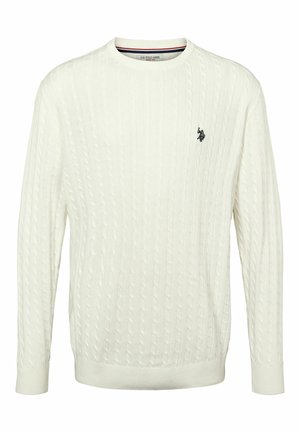 White cable-knit sweater with ribbed neckline and cuffs. Features a small black embroidered emblem on the left side. Textured fabric.