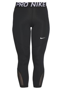 Mustat Nike Pro -legginsit, joissa on valkoinen swoosh-logo reidessä, verkkopaneelit prèsin lähellä ja merkitty vyötärö.