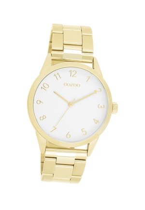 Montre en métal doré avec un cadran blanc rond, des chiffres arabes et des aiguilles dorées. Comprend un bracelet doré assorti au design en maillons.