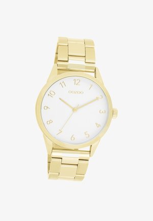 Montre en métal doré avec un cadran blanc rond, des chiffres arabes et des aiguilles dorées. Comprend un bracelet doré assorti au design en maillons.