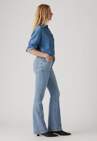Levi's® 726™ HIGH RISE FLARE - Flared Jeans - blue wave light