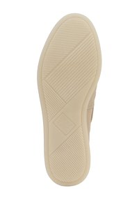 Light beige rubber shoe sole with textured grip pattern, featuring a smooth edge and logo imprint near the center.