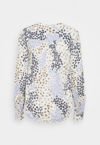 Blusa a maniche lunghe con sfondo bianco e una stampa floreale in blu, nero e marrone. Tessuto morbido, orlo arrotondato e polsini con bottoni.
