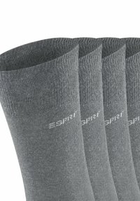 Calze in cotone grigio con texture a coste, dotate di un logo sul lato. Quattro paia esposti, che mostrano un design e un colore coerenti.