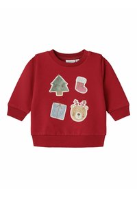 Maglione rosso con polsini e orlo a costine, decorato con applicazioni festive: un albero di Natale, una calza, un regalo e un orsetto.