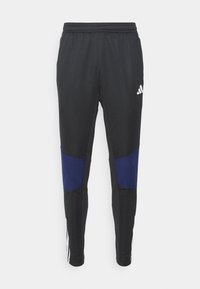 TIRO 23 COMPETITION WINTERIZED - Pantalon de survêtement - black/beige