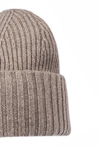 Beige ribbed knit wool beanie hat with folded cuff, designed for warmth and winter wear.