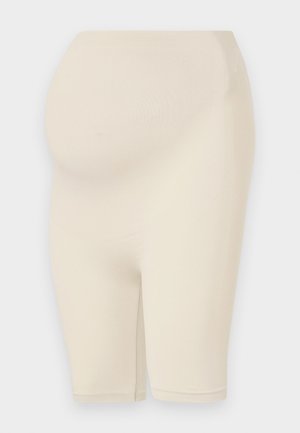 Shorts da ciclismo premaman beige realizzati in un tessuto morbido e elastico, con vita alta e una texture liscia. Lunghezza fino a metà coscia senza motivi visibili.