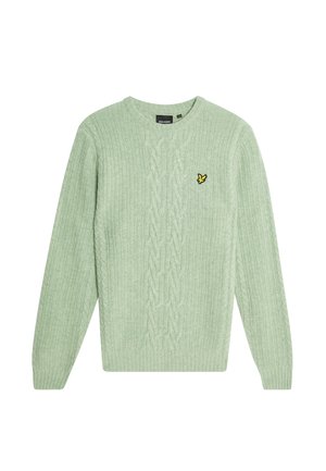 Maglione a maglia leggera verde chiaro con maniche lunghe, scollo tondo e un piccolo logo di un uccellino giallo sul lato sinistro del petto. Morbido al tatto.