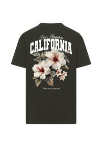 Mørkegrønt bomulds T-shirt med et blomsterdesign med hvide hibiscus og blade. Teksten lyder "Los Angeles CALIFORNIA" og "I dag var en god dag."