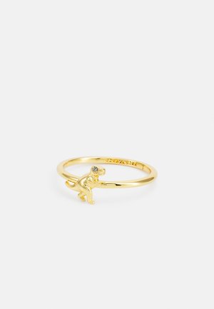 Gold-tone ring with a small dinosaur charm featuring a crystal eye, engraved with "COACH" inside the band.