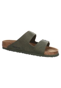 Open-toed Birkenstock sandal in olive green, featuring a textured upper, two adjustable straps, cork footbed, and rubber sole.
