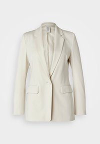 Blazer color crema con solapa muestrada, cierre de un solo botón y dos bolsillos frontales. Tejido suave con un diseño estructurado.
