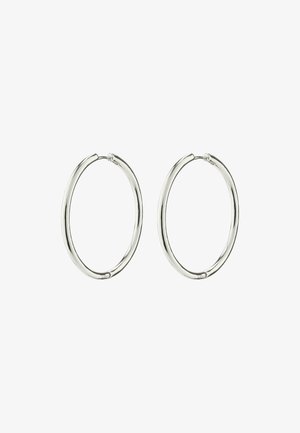 Silberne Creolen mit einer glatten, polierten Oberfläche. Runde Form, leichtes Design und mit einem sicheren Verschlussmechanismus ausgestattet.