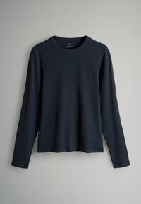 Marineblauses Langarmshirt aus geripptem Stoff, mit Rundhalsausschnitt und lockerem Schnitt, geradem Saum und ohne sichtbare Akzente.