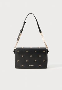 Black leather handbag with gold-tone emblem accents, rectangular shape, short top handle, and detachable chain shoulder strap.