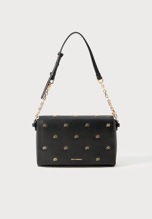 Black leather handbag with gold-tone emblem accents, rectangular shape, short top handle, and detachable chain shoulder strap.