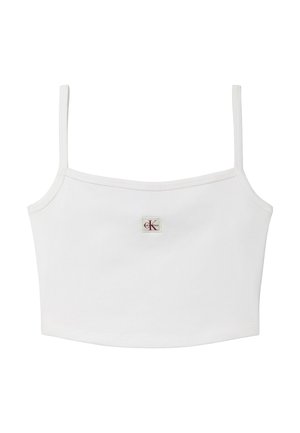 Biała krótka kamizelka na cienkich ramiączkach z małą czerwoną i czarną naszywką z logo "ck" umieszczoną centralnie w pobliżu dekoltu.