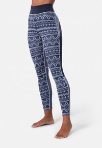 Marine patroon leggings met geometrische ontwerpen in verschillende tinten blauw, voorzien van een hoge tailleband en een strakke pasvorm, gemaakt van flexibel materiaal.