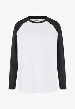 Baseballshirt met lange mouwen, wit lijf en zwarte mouwen en kraag, Urban Classics merklabel zichtbaar aan de binnenkant van de kraag.