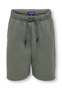 Grønne svedshorts lavet af bomuldsblanding, med elastisk talje og snor, sidelommer og en glat tekstur.