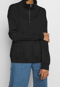 Monki Felpa - black