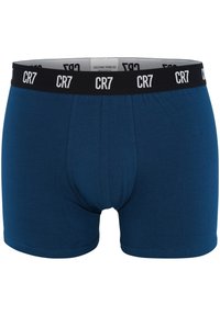 Boxers de algodón azul con una cinturilla elástica negra que presenta letras blancas "CR7". Textura suave, diseño ajustado con un bolsillo contorneado.