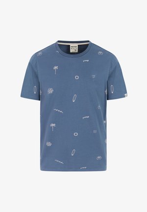Blue cotton t-shirt with short sleeves featuring white graphic patterns of palm trees, sun, surfboards, and abstract shapes. Round neck design.