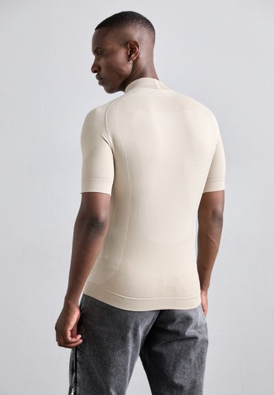 MISBHV Potiskana majica - beige