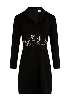 Vestido blazer negro de manga larga con cuello con muesca y un detalle de panel de encaje en la cintura.