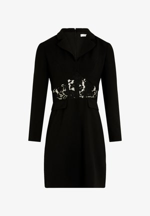 Zwarte blazerjurk met lange mouwen, een reverskraag en een kantpaneel detail op de taille.