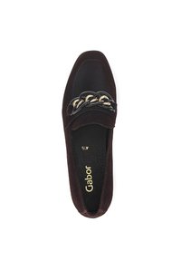 Black suede slip-on shoe with a rounded toe, gold and black chain accent on the vamp, and a textured insole featuring Gabor branding.