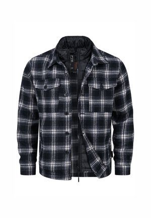Veste à carreaux en polaire noire et blanche. Comprend deux poches poitrine, une fermeture à boutons et un devant zippé pour plus de chaleur.