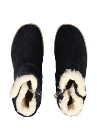 Black suede ankle boots with white faux fur lining, rounded toes, and zipper accents at the side. Flat soles for casual wear.