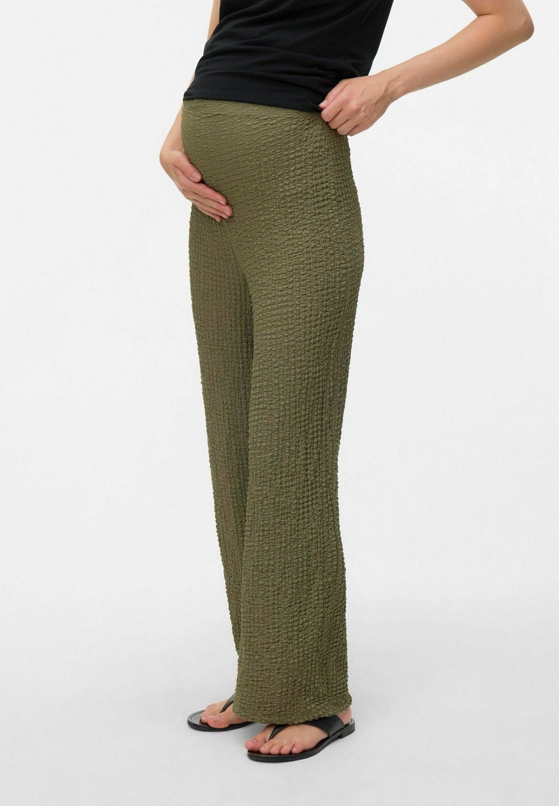Olive green, textured maternity pants with a wide leg design, featuring a fitted waistband for comfort and a relaxed style.