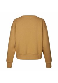 Musztardowy, krótki sweatshirt z okrągłym dekoltem, opadającymi ramionami i ściągaczami. Gładka faktura, prosty design, brak widocznych logo.