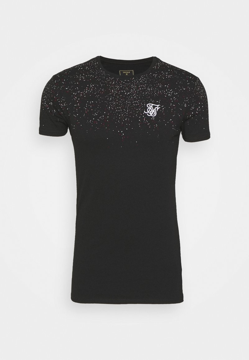 Czarny bawełniany t-shirt z teksturowanym wzorem, ozdobiony przypadkowymi białymi i czerwonymi kropkami. Zawiera małe białe logo po lewej stronie na piersi.