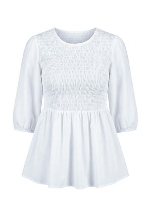 Blusa bianca con corpetto arricciato, scollo tondo, maniche tre quarti a sbuffo e orlo a peplo svasato.