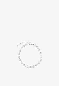 Pulsera de cadena de plata con pequeños eslabones redondos en forma de remolino y cierre de langosta con extensión de cadena ajustable.