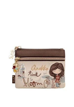 Piccola pochette beige e marrone con cerniera, con una bambina dei cartoni animati, bicicletta, ciondolo floreale e il testo "Anekke time to bloom."