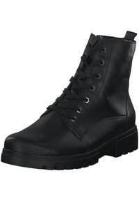 Bottines en cuir noir avec un bout rond, présentant un laçage à l'avant, des œillets texturés et une semelle robuste pour une adhérence et une durabilité optimales.