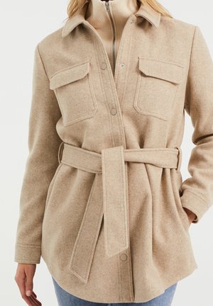 Halflange jas - beige