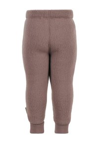 Fleece leggings in gedempt mauve, met een zachte textuur, elastische tailleband en aansluitende boorden. Naaddetails langs de achterkant.