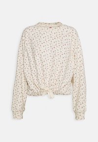 Zkrácená mikina v krémové barvě s malým květinovým potiskem, žebrovanými manžetami a svázaným lemem. Měkká tkanina s volným střihem a kulatým výstřihem.