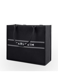 Black fabric tote bag with two handles, rectangular shape, featuring white striped accents and the text "Carluheim" displayed prominently.