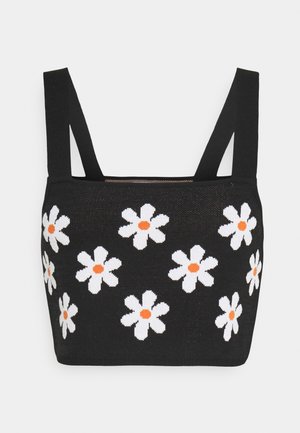 Czarny krótki top na szerokich ramiączkach, zdobiony białymi stokrotkami z pomarańczowymi środkami. Miękka dzianinowa tekstura z dopasowanym krojem.