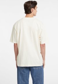 Guess Jeans VINTAGE - Marškinėliai su spaudiniu - creme