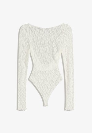 White lace bodysuit with long sleeves, featuring a woven pattern and a low back design, tapering to a high-cut leg opening.
